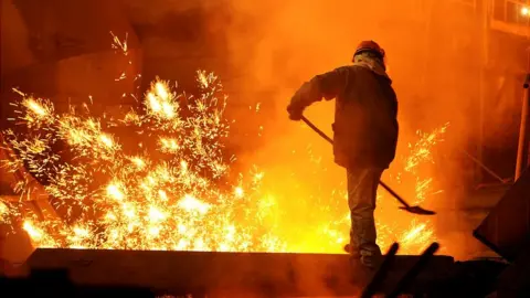 Getty Images Worker at steel plant