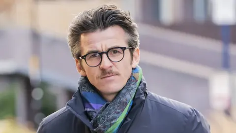 PA Media Joey Barton arrives at court