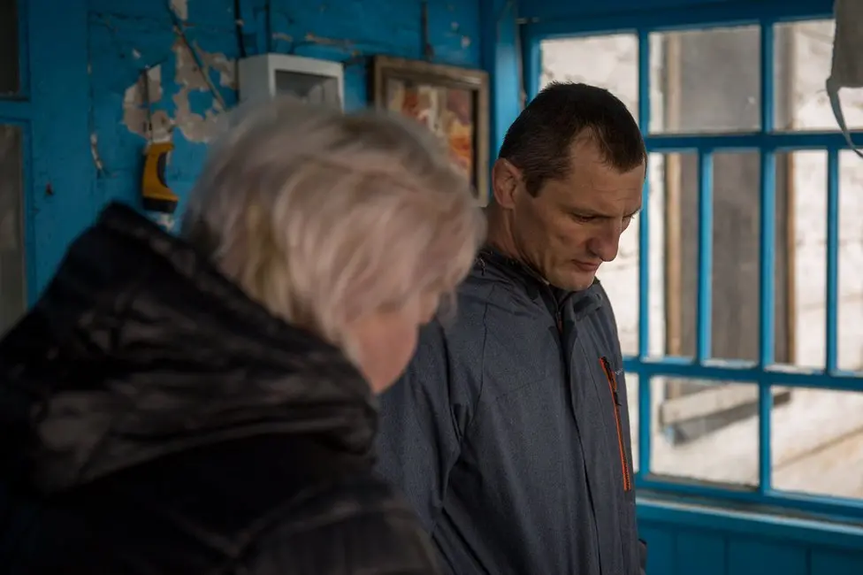 BBC Sasha's brother Vyacheslav and his wife, at Sasha and Nikita's house in the village