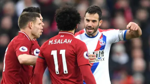 Liverpool and Crystal Palace players arguing