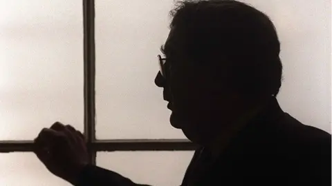 Pacemaker John Hume in silhouette