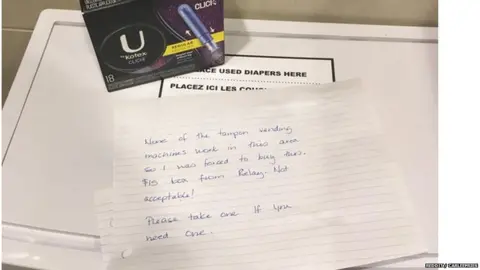 Reddit / CarleeFries A picture of the note offering free tampons to airport travellers