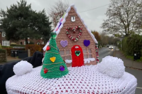 Steph Reston Christmas postbox topper in Stapleford