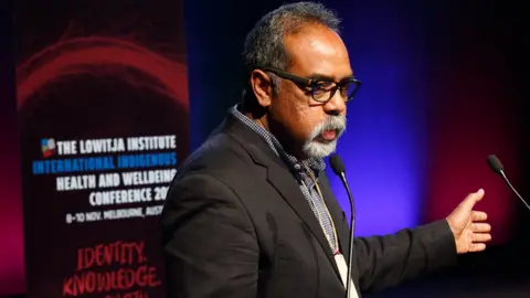 LOWITJA INSTITUTE Romlie Mokak speaks at a conference