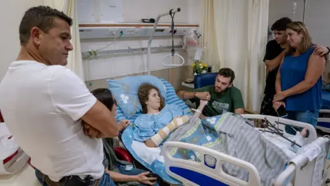 The whole family pictured in hospital