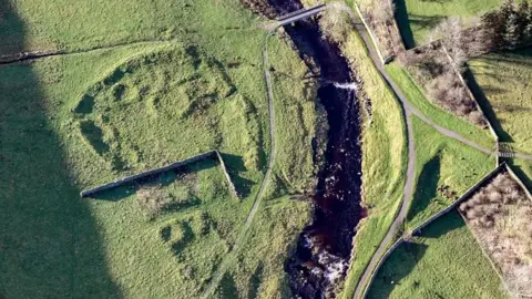 Historic England Aerial shot of a walled settlement 200m south-east of East Mellwaters Farmhouse, County Durham.