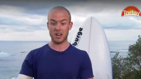 British doctor 'punches shark' in Australia surfing scare - BBC News