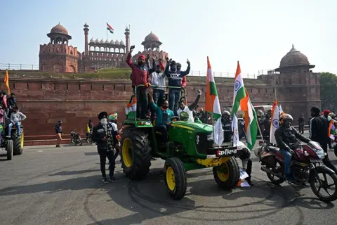 SAJJAD HUSSAIN/AFP Farmers in front of Red Fort in New Delhi