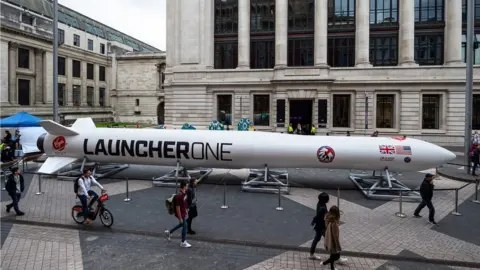 UK Space Agency A computer generated image of a replica rocket outside a public building