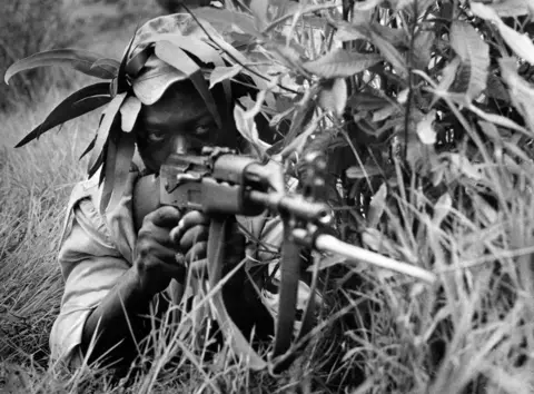 AFP A nationalist Rhodesian fighter trains May 05, 1975 in the South of Rhodesia. The Rhodesian government and the black nationalists face a long guerrilla which led to an agreement and a multiracial new Assembly in 1978. In 1980, British government proclaimed the independence of South Rhodesia, becoming Zimbabwe.