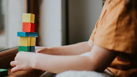 Getty Images child with blocks