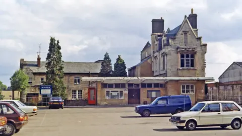 Geograph/Ben Brooksbank Cirencester's old railway station in the 1980s