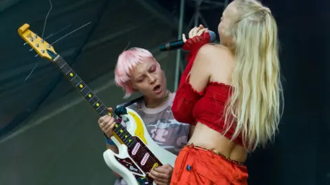 Getty Images The band have drawn comparisons to artists like The Cribs, Blondie and Bjork