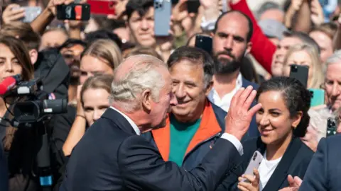 PA Media King Charles greets the public at Buckingham Palace