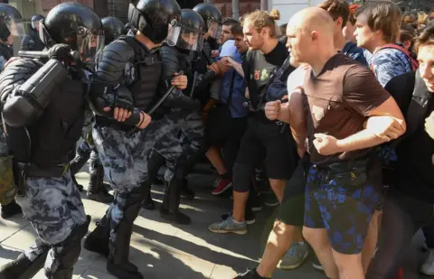 AFP Police and protesters in Moscow, 27 July