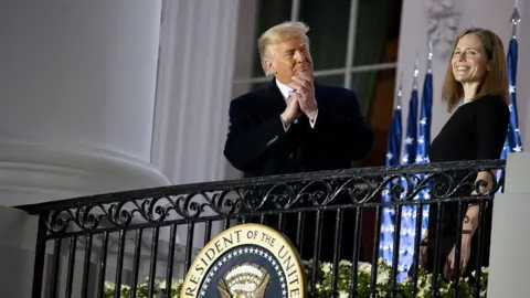 Getty Images Trump applauds newly sworn in Supreme Court Justice pick Amy Coney Barrett