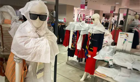 BBC Jarrold mannequins wrapped in tissue paper