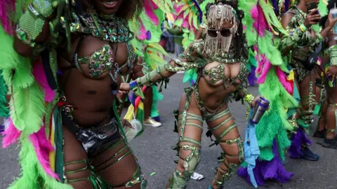 PA Media Adorned with jewels head to toe keep the party moving