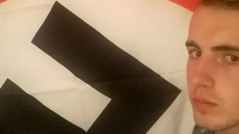 BBC Ethan Stables and his prized swastika flag