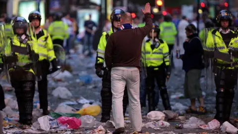 Getty Images Rangers fan faces policeman