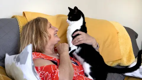 PA Media Zebby and his owner