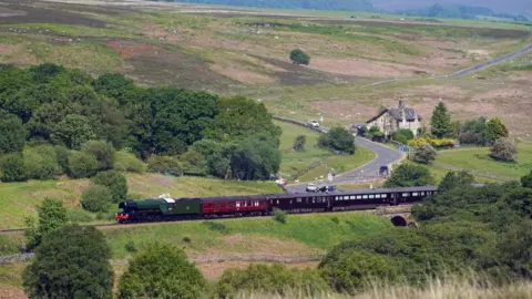 PA Media The Royal train pulled by the Flying Scotsman in celebration of its 100th anniversary