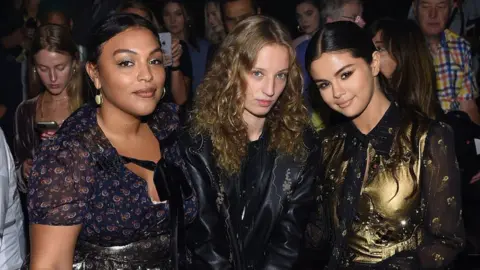 Getty Images Selena Gomez and guests attend Coach fashion show in 2018