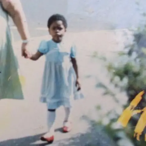 Gina Atinuke Knight as a young girl