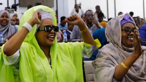 Feisal Omar/Reuters Somali lawmakers applaud after President Hassan Sheikh Mohamud addressed parliament regarding the Ethiopia-Somaliland port deal in Mogadishu, Somalia - Tuesday 2 January 2024