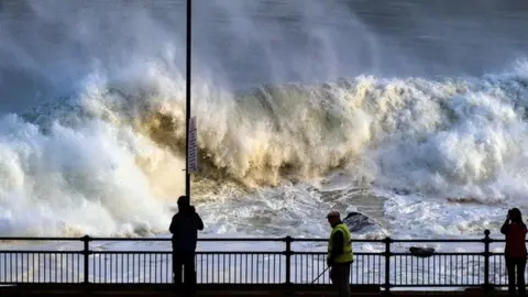 S A Brown Huge waves crashed along the shore at Portstewart from the remnants of Hurricane Epsilon