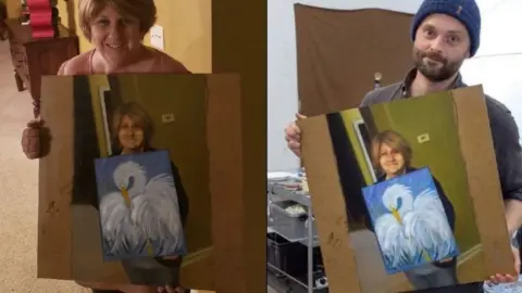 Cindi Decker/ Kristoffer Zetterstran Cindi Decker (left) holds Kristoffer Zetterstran's (right) painting of her holding her bird painting