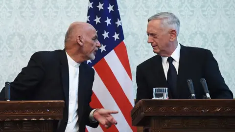 AFP US Defense Secretary Jim Mattis (R) speaks with Afghan President Ashraf Ghani during a press conference at the Presidential Palace in Kabul on September 27, 2017