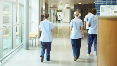 Getty Images Health workers