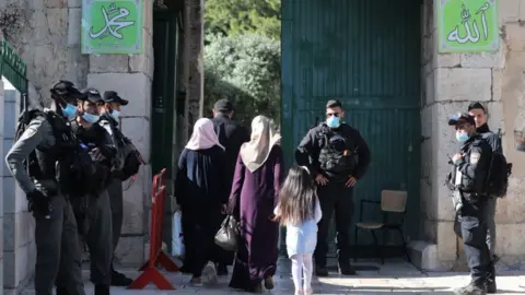 EPA Muslim worshippers enter the Al-Aqsa Mosque compound in Jerusalem's old city