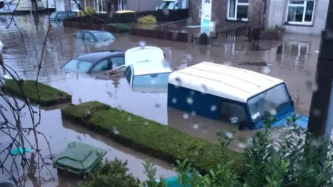 Tracey Newman Cars are submerged in Nantgarw