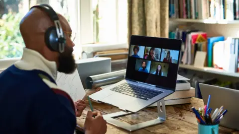 Getty Images Man working from home