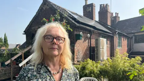 BBC Mary Smail outside her home