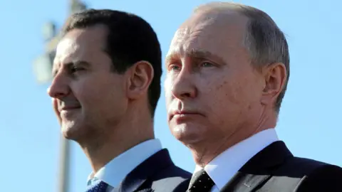 Reuters Syrian President Bashar al-Assad photographed with Vladimir Putin