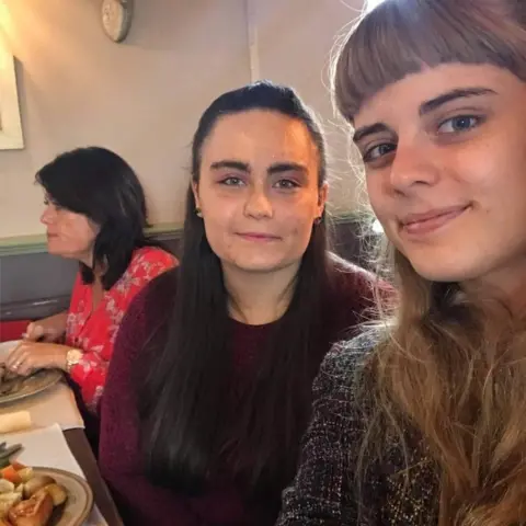 Kirstie (right) and Laura having a pub lunch on Laura's birthday - Laura was unable to eat her nut roast