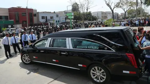 Reuters hearse at hospital in lima