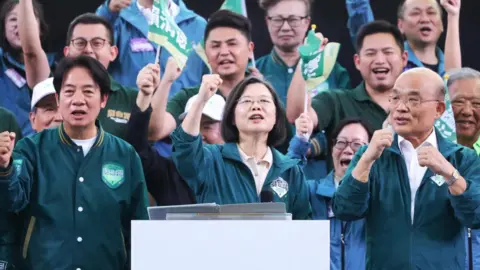 Getty Images Tsai Ing-wen, Taiwan's president, center, during a rally at the Banqiao First Stadium in New Taipei City, Taiwan, on Saturday, Nov. 4, 2023.