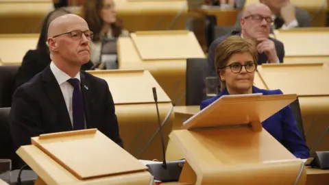 Andrew Cowan/Scottish Parliament john swinney and nicola sturgeon