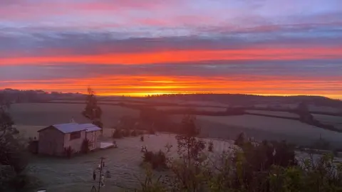 Jayne P The stunning sunrise over West Buckland in Devon