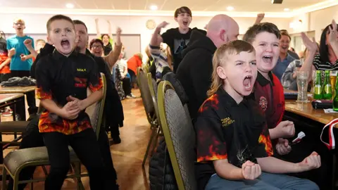 Peter Byrne Members of Luke Littler's local club