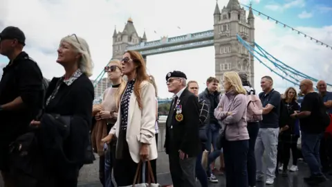 Reuters People queuing to see the Queen lying in state