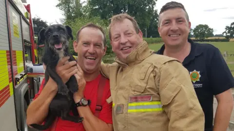 Staffordshire Fire and Rescue Service Firefighters with Teddy after the rescue