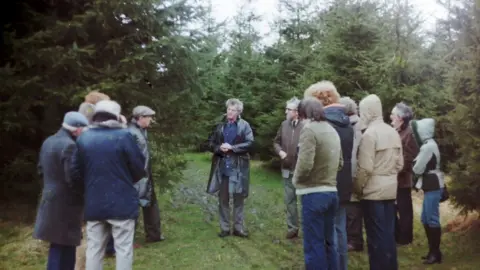 Malcolm Robinson Robert Taylor gives a talk to members of the British UFO Society in Dechmont Woods