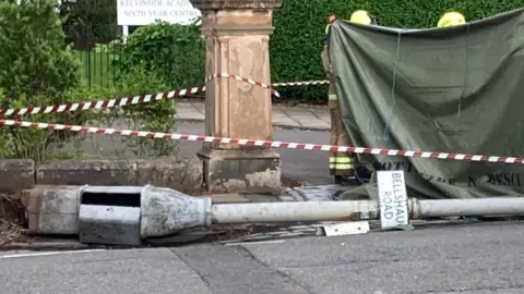 Fallen lamp post outside Kelvinside Academy