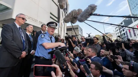 Getty Images Western Australia police commissioner Chris Dawson addressing gathered media outside court after the verdict