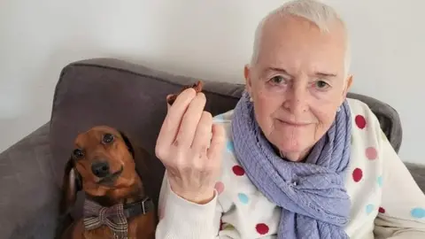 Toni Lee Doz Lee and sausage dog Rupert